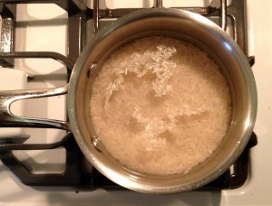 Cooking rice in a small saucepan on the stovetop