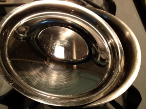 Cooking rice in a small saucepan on the stovetop 