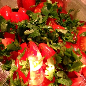Tomatoes and fresh cilantro for tomato raita