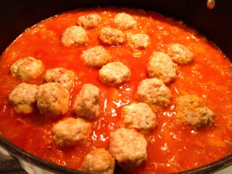 Gently boiling meatball curry