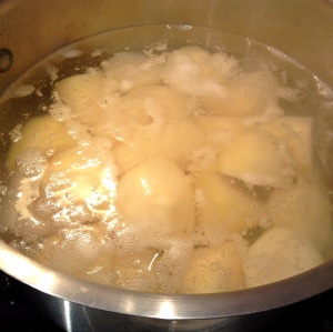 Boiling potatoes for playa with masala dosa