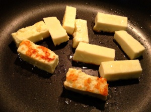 Lightly browning pieces of paneer in non-stick frying pan for Mattar Paneer