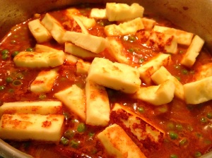 Adding browned paneer pieces for Mattar Paneer