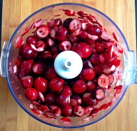 Pulse the whole cranberries in a food processor, which makes the cooking process easier